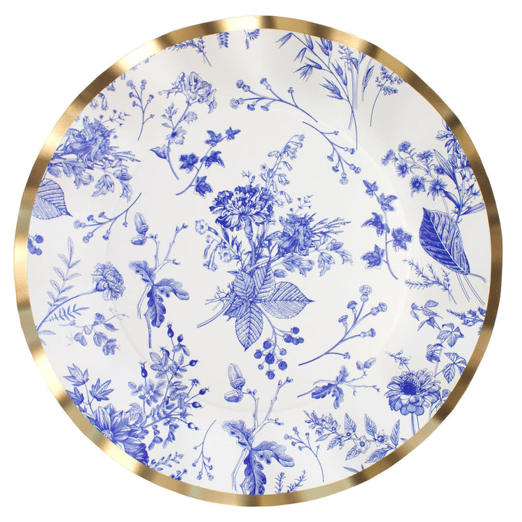 White paper dinner plate with ruffled edge, blue accents, and metallic gold rim.