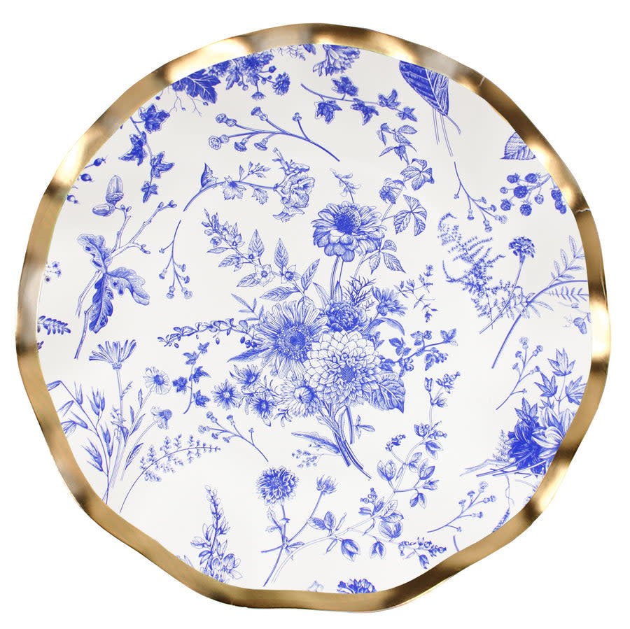White paper salad plate with ruffled edges, blue accents, and a metallic gold rim.