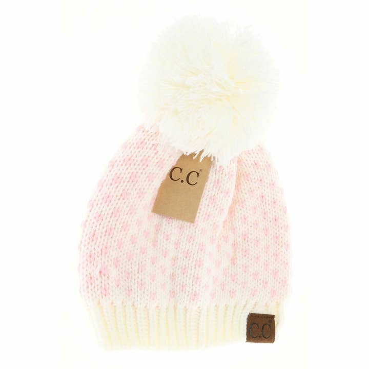 Heart Knit Pom Beanie in soft gray wool with a textured cable pattern and fluffy pom top.