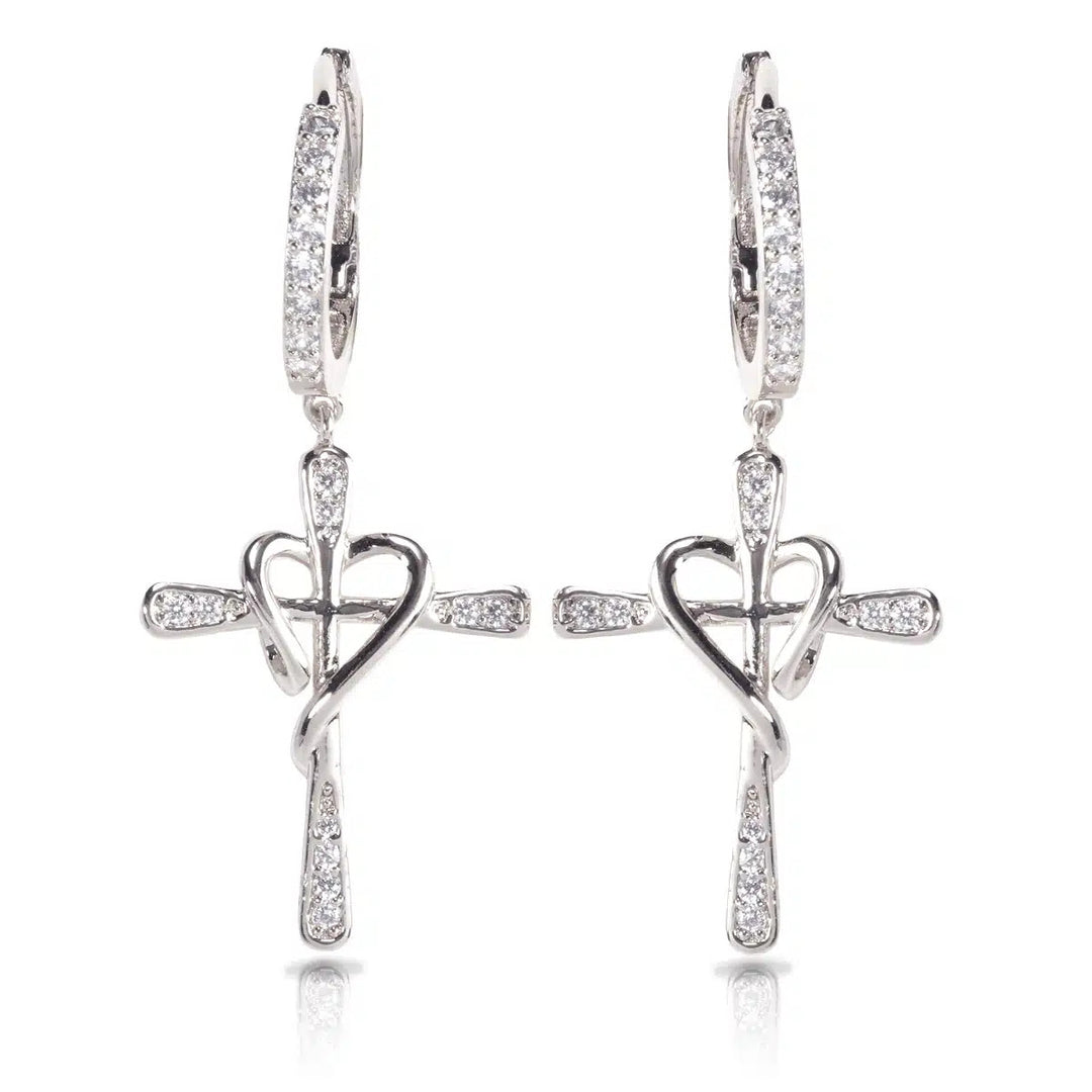 Silver pave cross heart earrings with pave-set lever back closures.