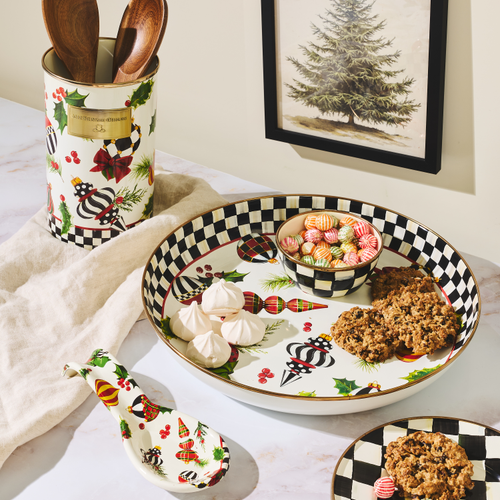 Deck the Halls Utensil Holder with wooden spoons next to a matching holiday serving tray.