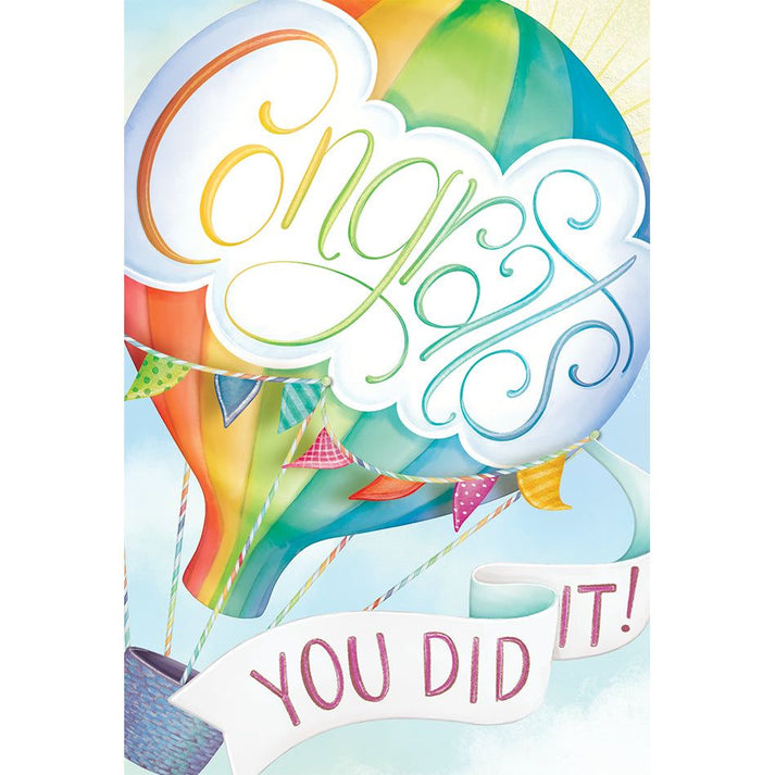 Congratulations card with glitter refinements featuring a hot air balloon outside text reading Congrats You Did It and inside text saying You should be very proud of this achievement