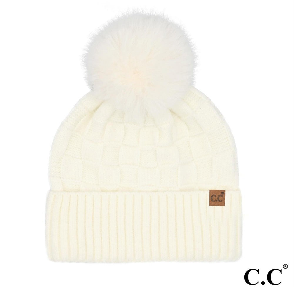 Weaving Texture Pom Beanie in neutral tone with faux fur pom detail