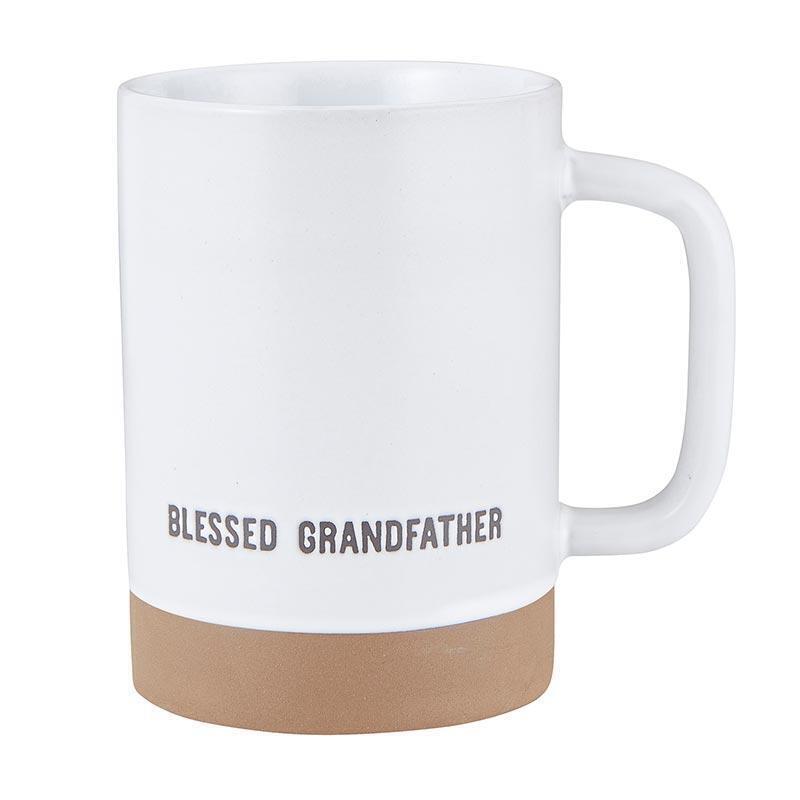 White ceramic mug with a simple cylindrical shape.