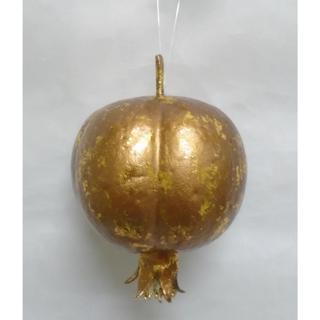 Luxe Pome Ornament Med in a textured metallic gold finish with a pomegranate shape.