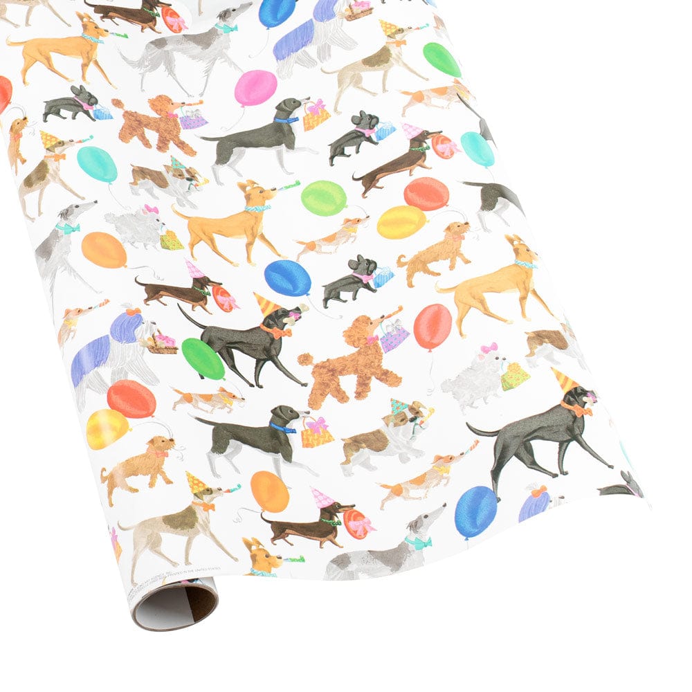Winston and Friends gift wrapping paper featuring various dogs in party hats with balloons.