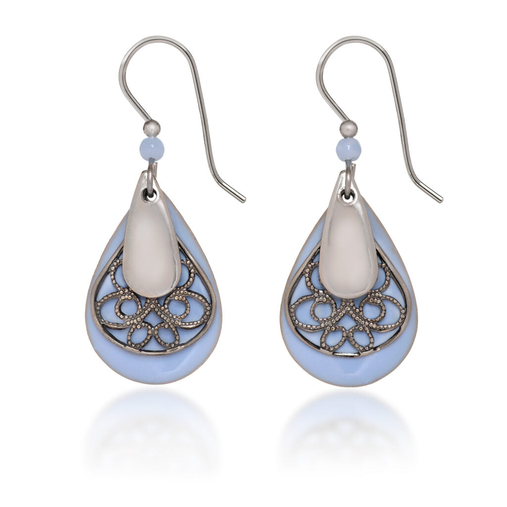 Layered teardrop earrings with light blue enamel, silver filigree, and a small blue bead accent.