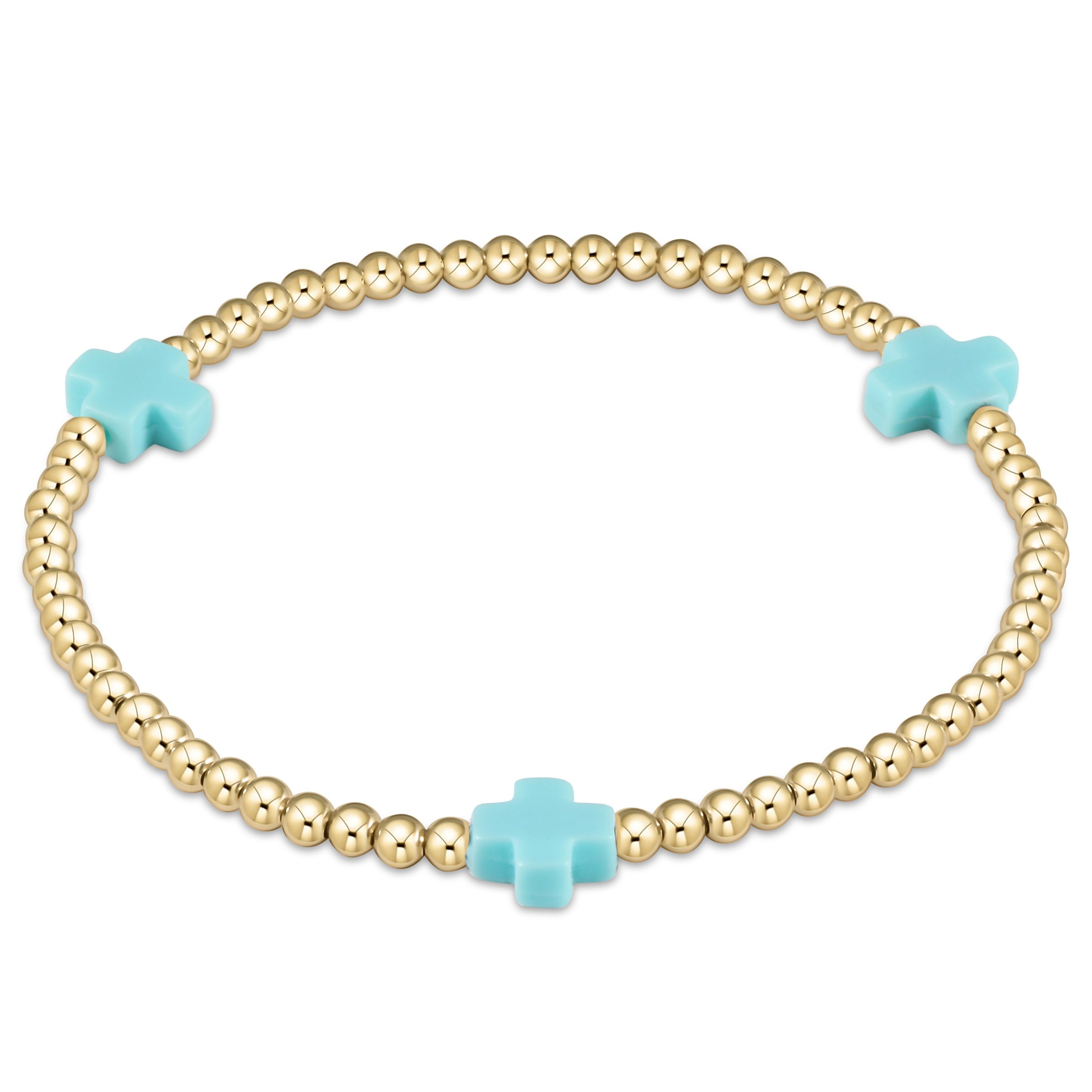 Enewton Signature Cross gold-filled bracelet with a cross bead pattern on high-performance elastic cord