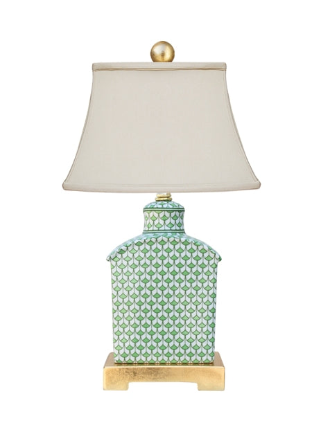 Porcelain green lamp shaped like a fish scale tea candy jar with a ceramic finish.