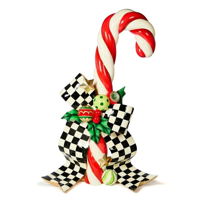 60-inch glossy resin candy cane trophy with red-and-white striped pattern on a black stand.