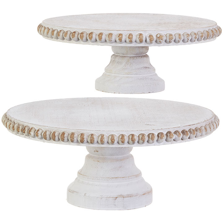 Distressed Beaded Edge Pedestal in a neutral tone with beaded trim along the top rim.