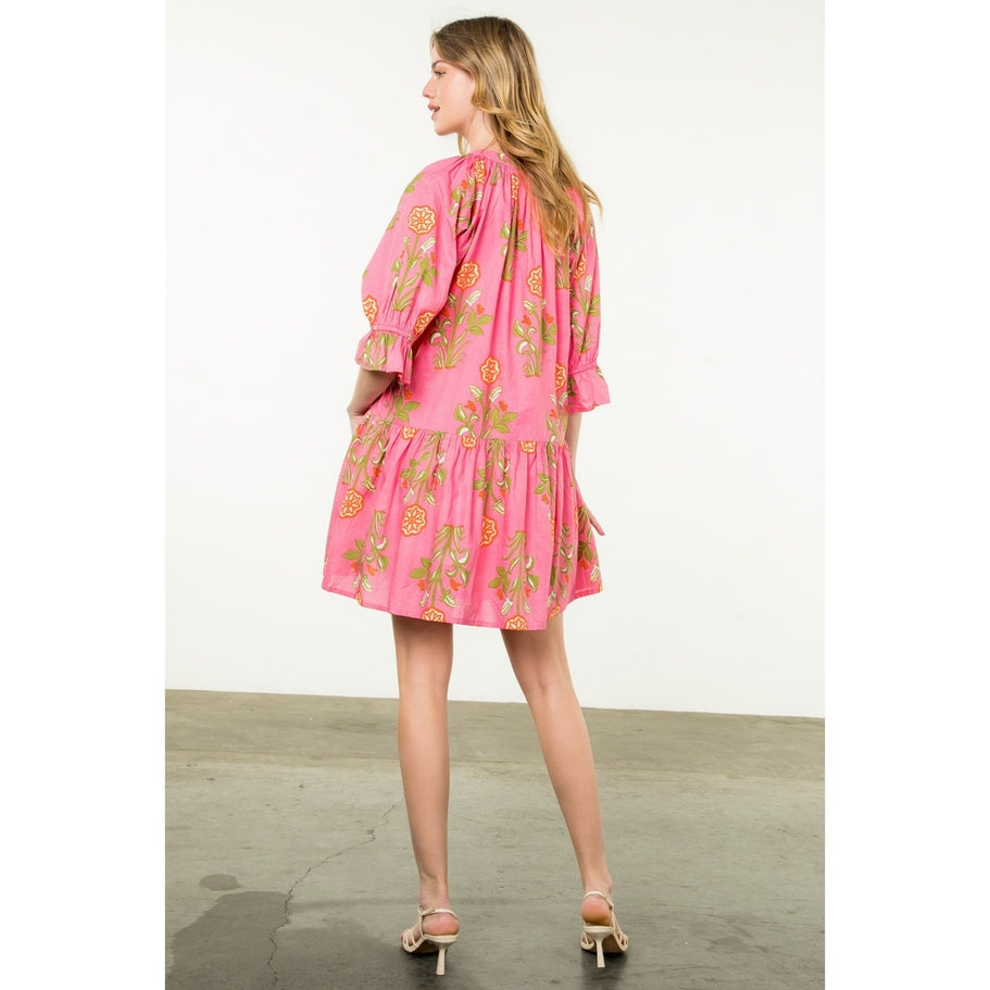 Hazel woven cotton short sleeve dress with floral print in a relaxed A-line silhouette.