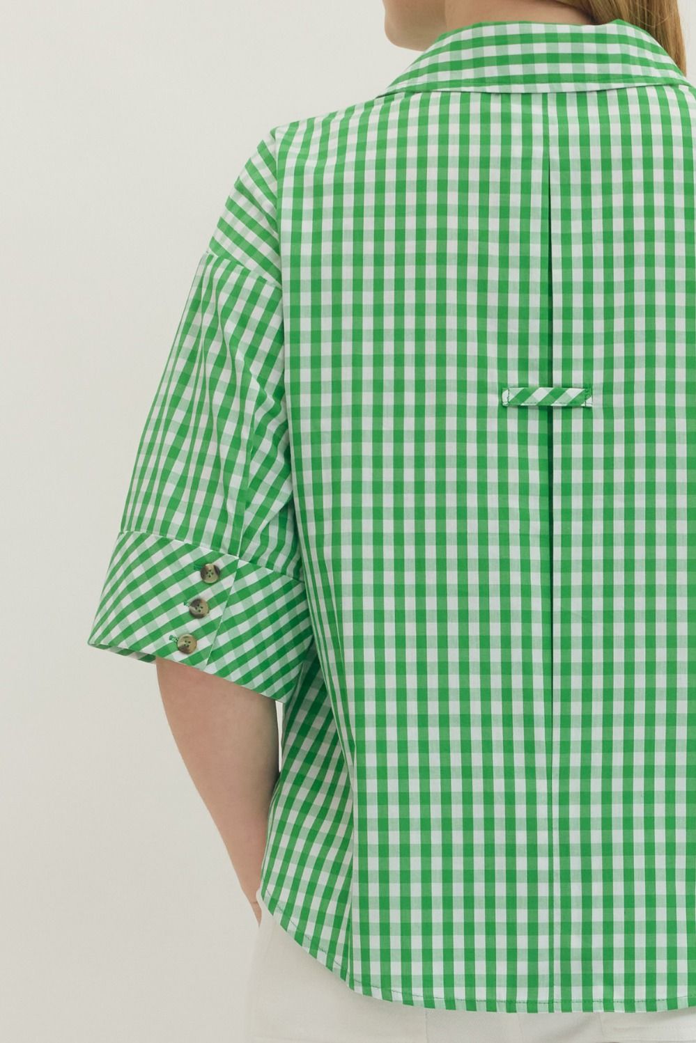 Pamela gingham print cotton top with split V-neck collar and buttoned cuffs