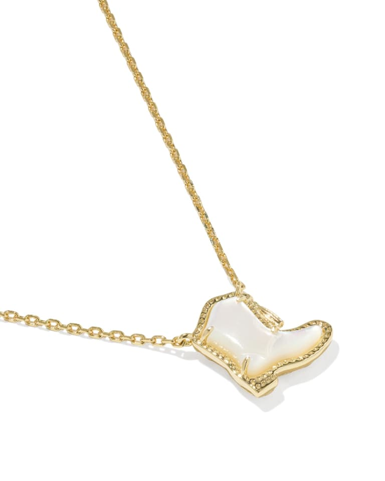 Gold chain necklace with a white mother-of-pearl cowboy boot pendant.