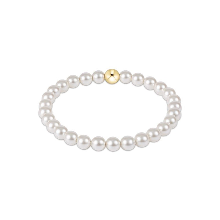 Classic Pearl 6mm Bead Bracelet featuring white crystal pearls and a single gold bead.