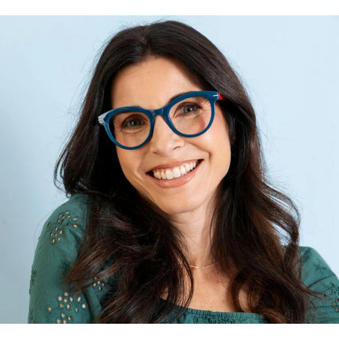 Daphne eyeglasses with blue light focus lenses in a clear frame.