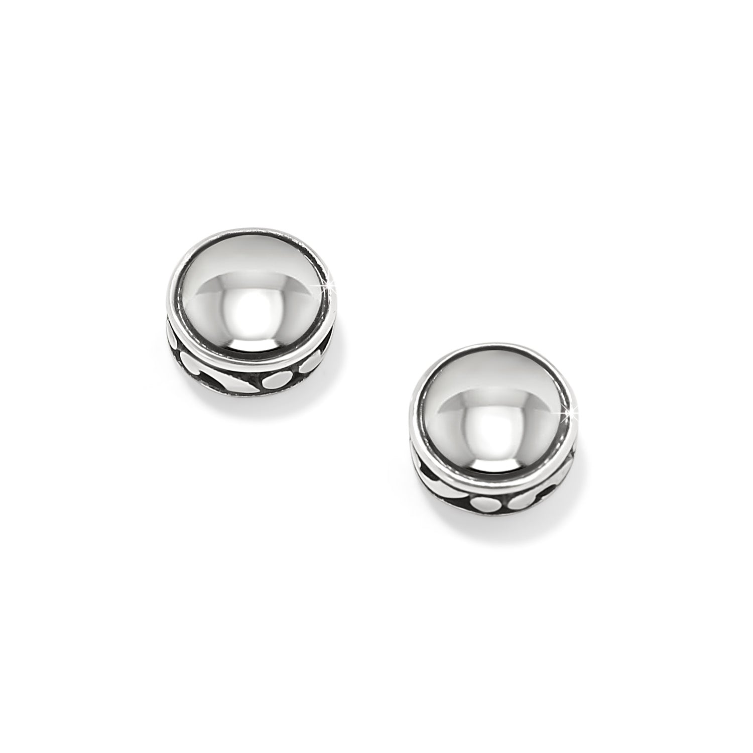 Round silver-plated Contempo Nuevo post earrings with a polished dome and patterned edge.