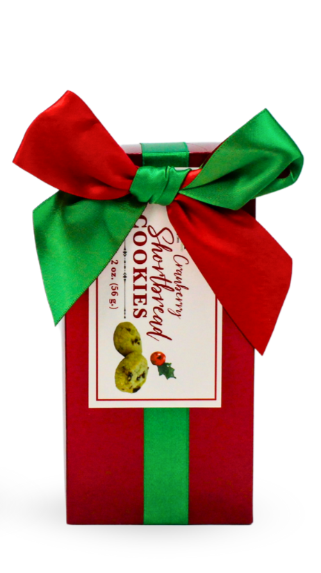 Red gift box with a green and red bow containing 2 oz of Cranberry Shortbread Cookies.