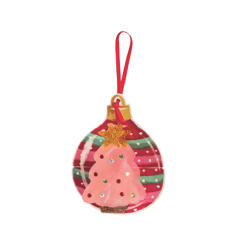 Pink Christmas tree claw clip with rhinestones on a red and green ornament display card.