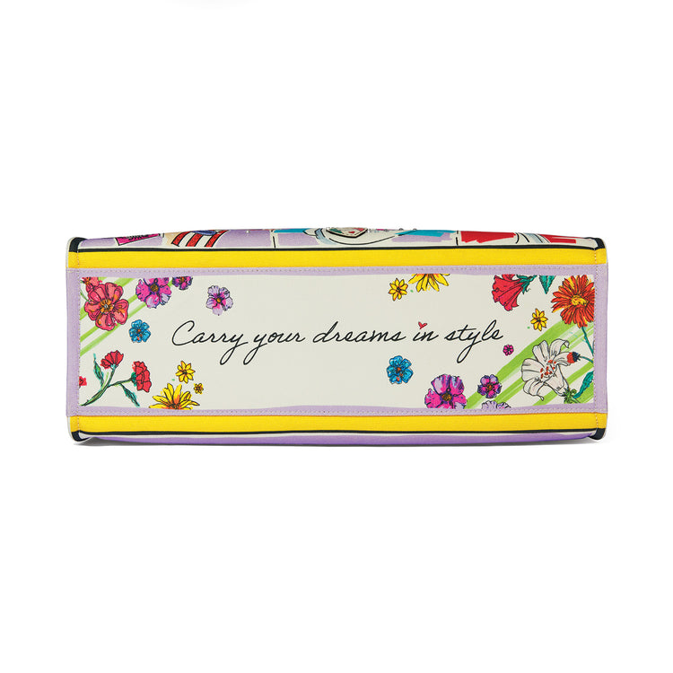 Bottom of a canvas tote with floral art and the text "Carry your dreams in style."