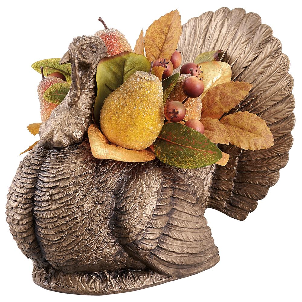 11-inch brown resin turkey figurine filled with beaded yellow pears, red berries, and fall leaves.