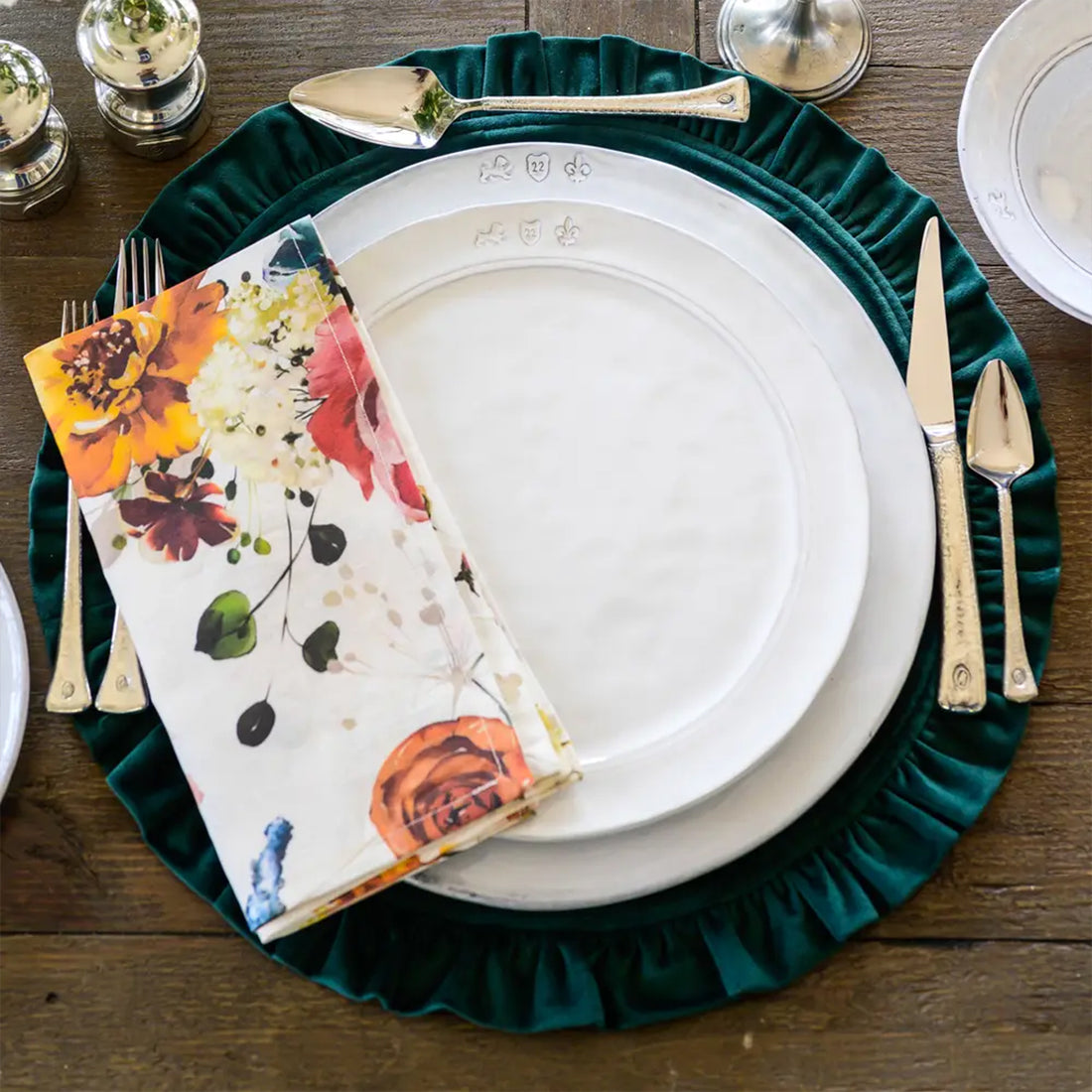 Round ruffle velvet placemat in a soft neutral tone with an 18-inch diameter.