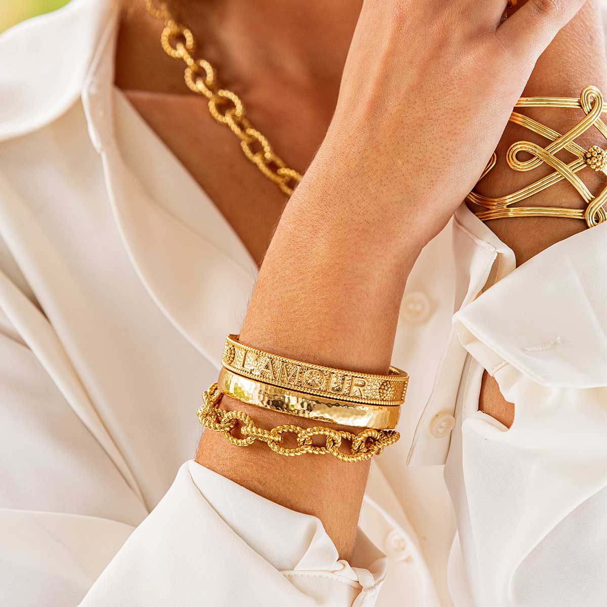 Gold hinged bangle bracelet with anti-tarnish coating
