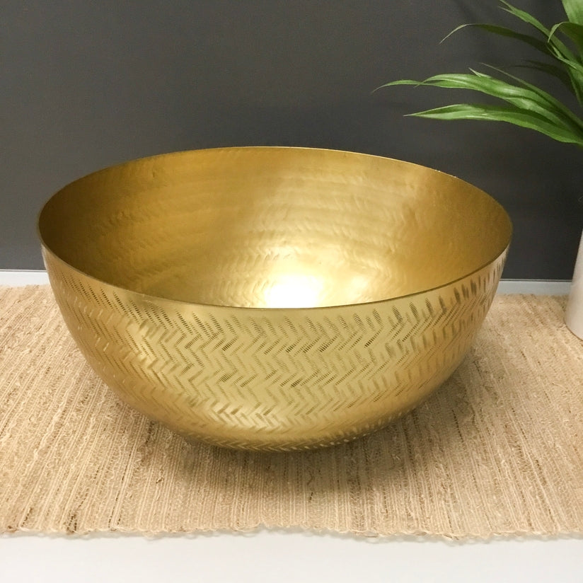 Gold hammered lehar zig-zag bowl with a metallic finish