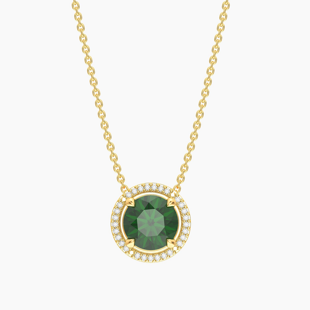 Gold-plated birthstone pendant necklace with a round green center stone and diamond halo.