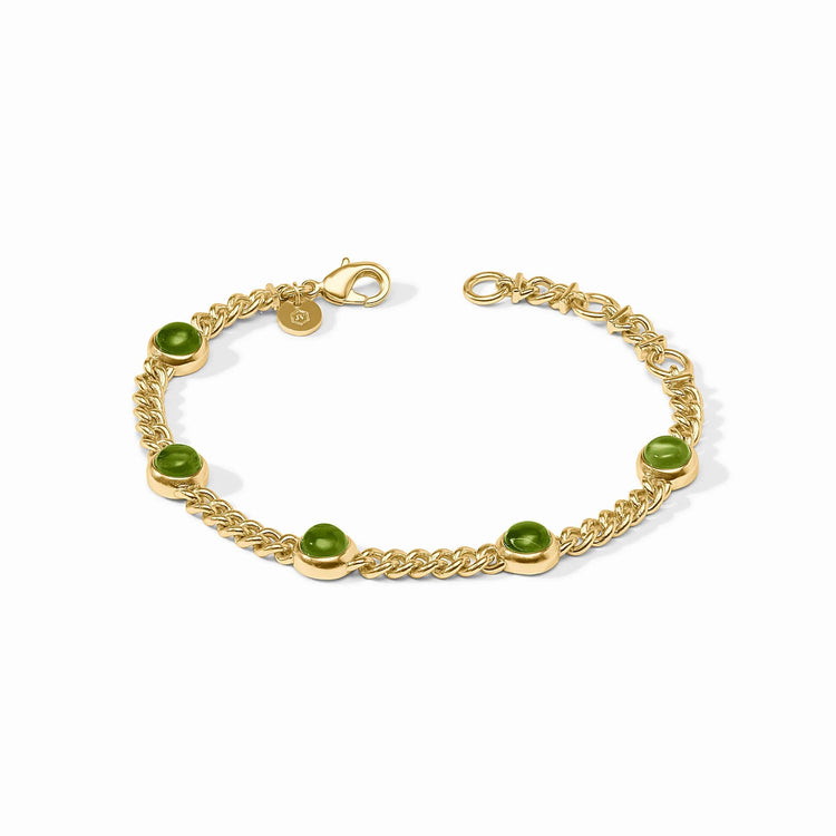 Gold chain bracelet featuring five round green cabochon stones and a lobster clasp.