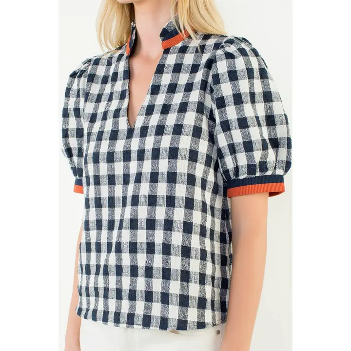 Navy checkered puff sleeve V-neck top with a relaxed fit.