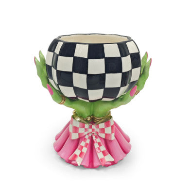 Glam 'O' Ween Treat Bowl featuring green hands holding a checkered bowl above a pink ruffled base.