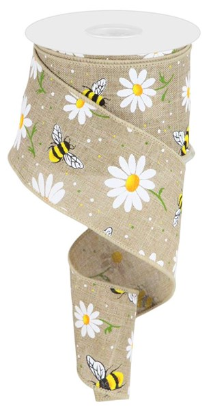 Royal blue fabric with bumble bee and daisy print in yellow, green, orange, black, white.