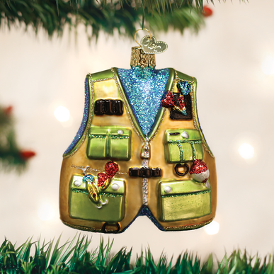 Glittery glass fishing vest Christmas ornament with miniature lures, bobbers, and pockets.