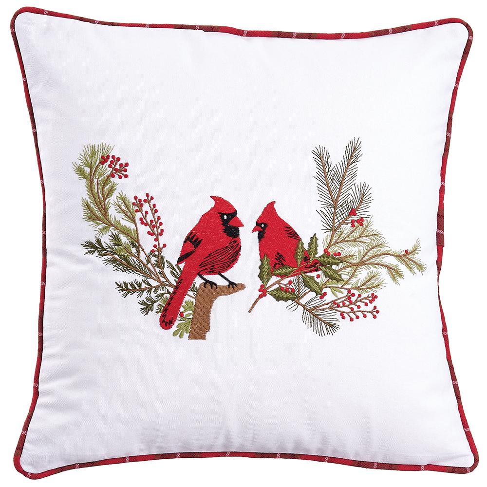 16-inch white square pillow with embroidered red cardinals on pine branches and red piped edges.