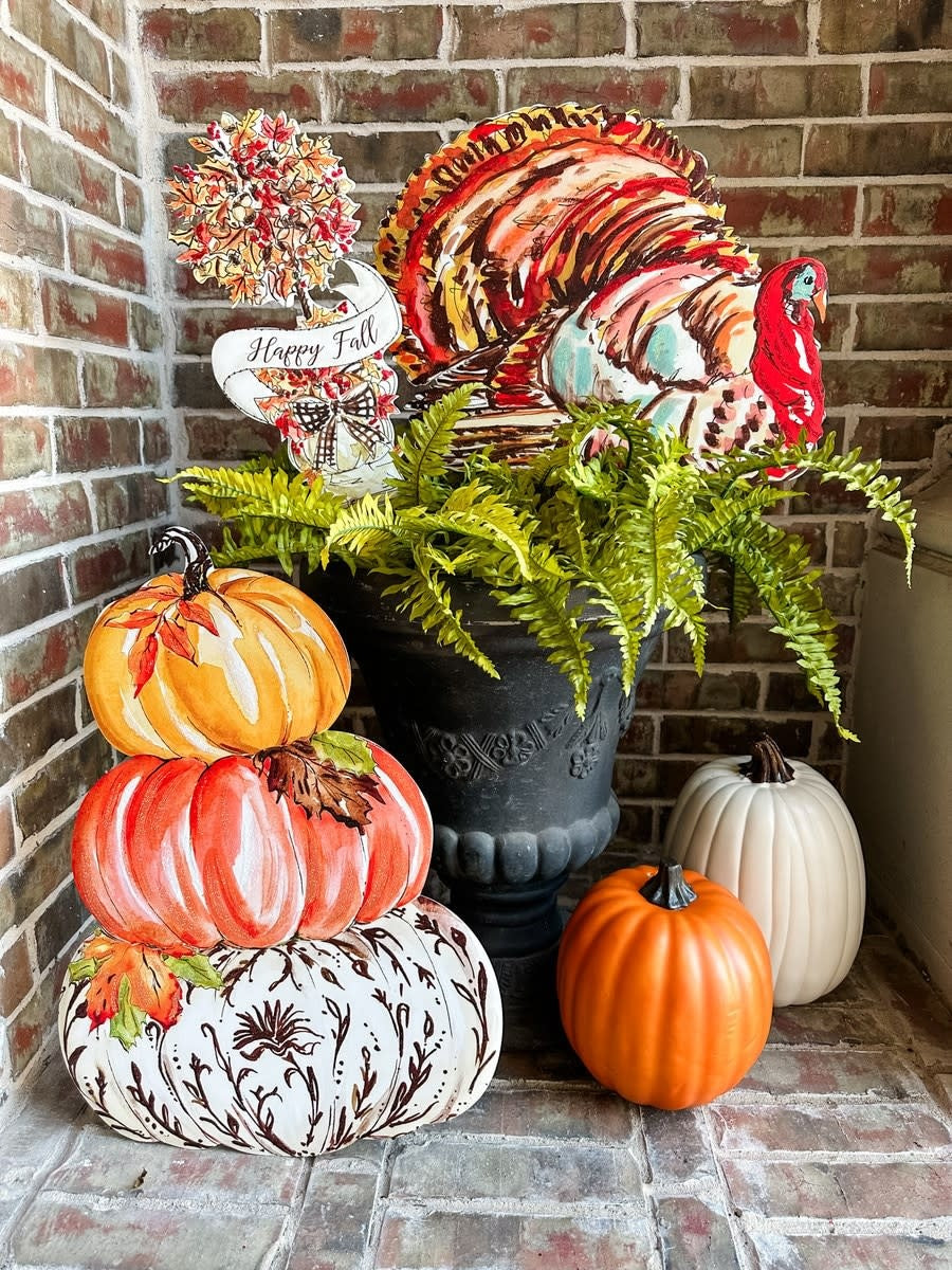Traditional turkey fall decoration with matte finish in brown and orange tones.