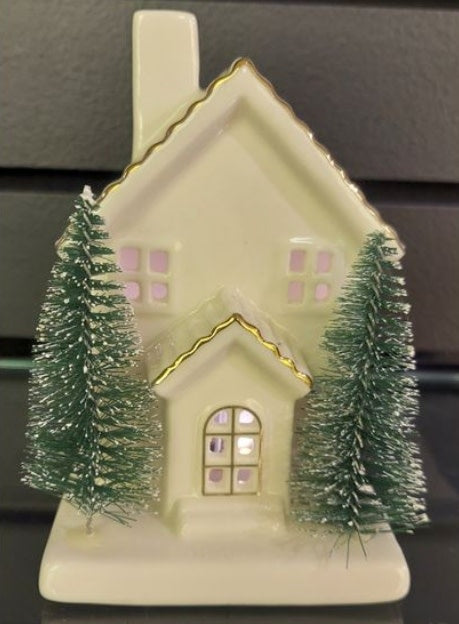 Translucent porcelain house with two bottlebrush trees inside