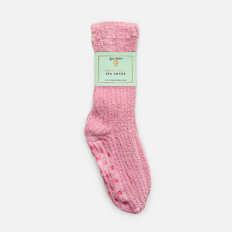 Fuchsia treatment spa socks made with aloe-infused fabric.