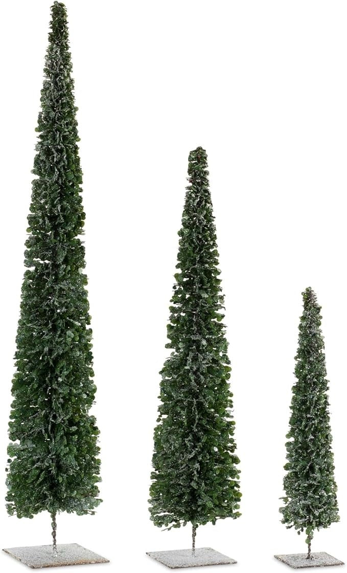 Small resin Christmas tree with full lifelike branches on a sturdy base