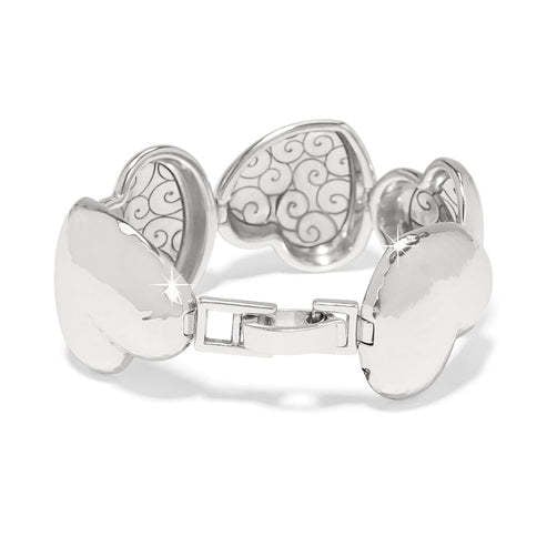 Silver plated heart link bracelet with hammered finish and fold over clasp