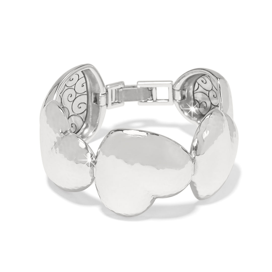 Silver plated asymmetrical heart link bracelet with hammered finish texture