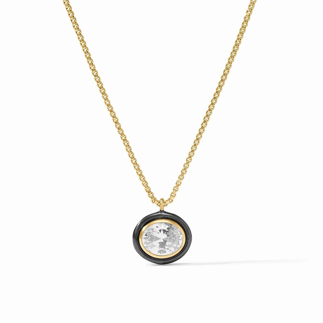 Delicate gold-plated necklace with a cubic zirconia pendant on an adjustable chain.