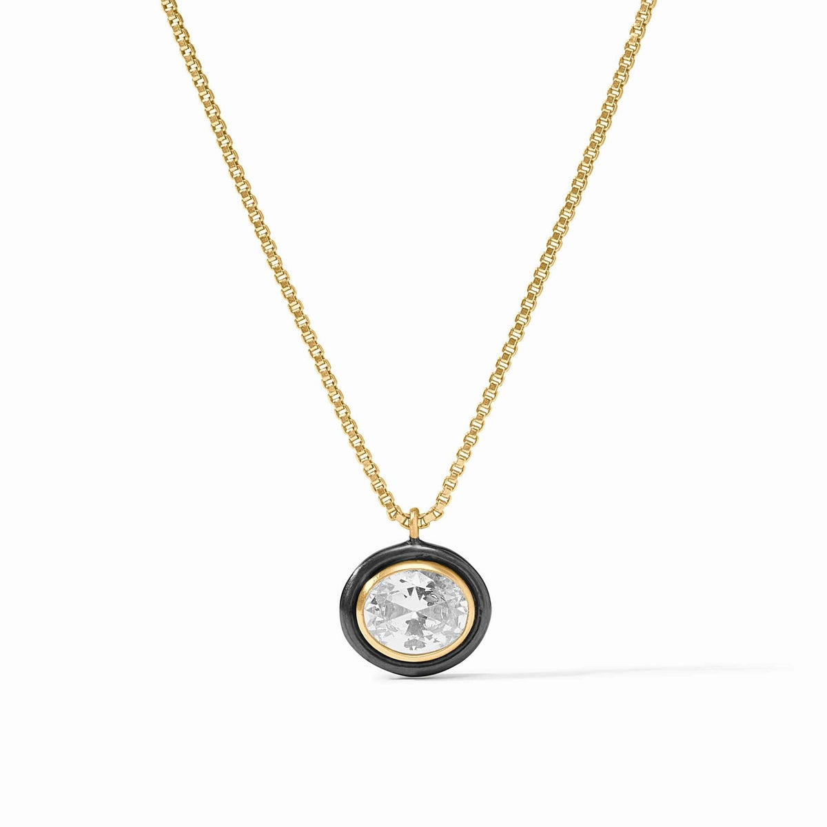 Delicate gold-plated necklace with a cubic zirconia pendant on an adjustable chain.