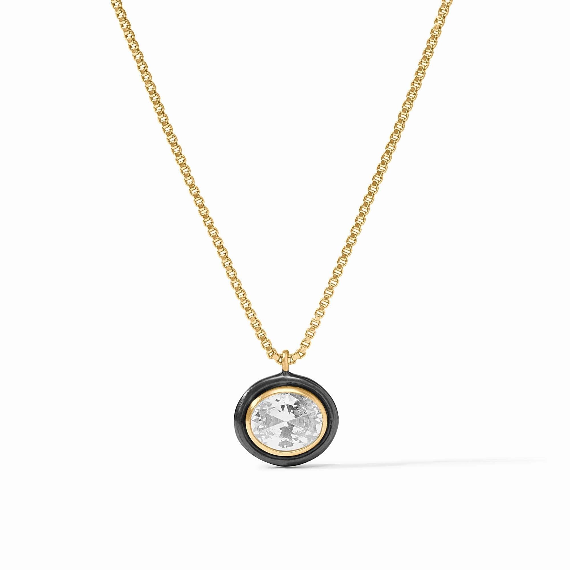 Delicate gold-plated necklace with a cubic zirconia pendant on an adjustable chain.