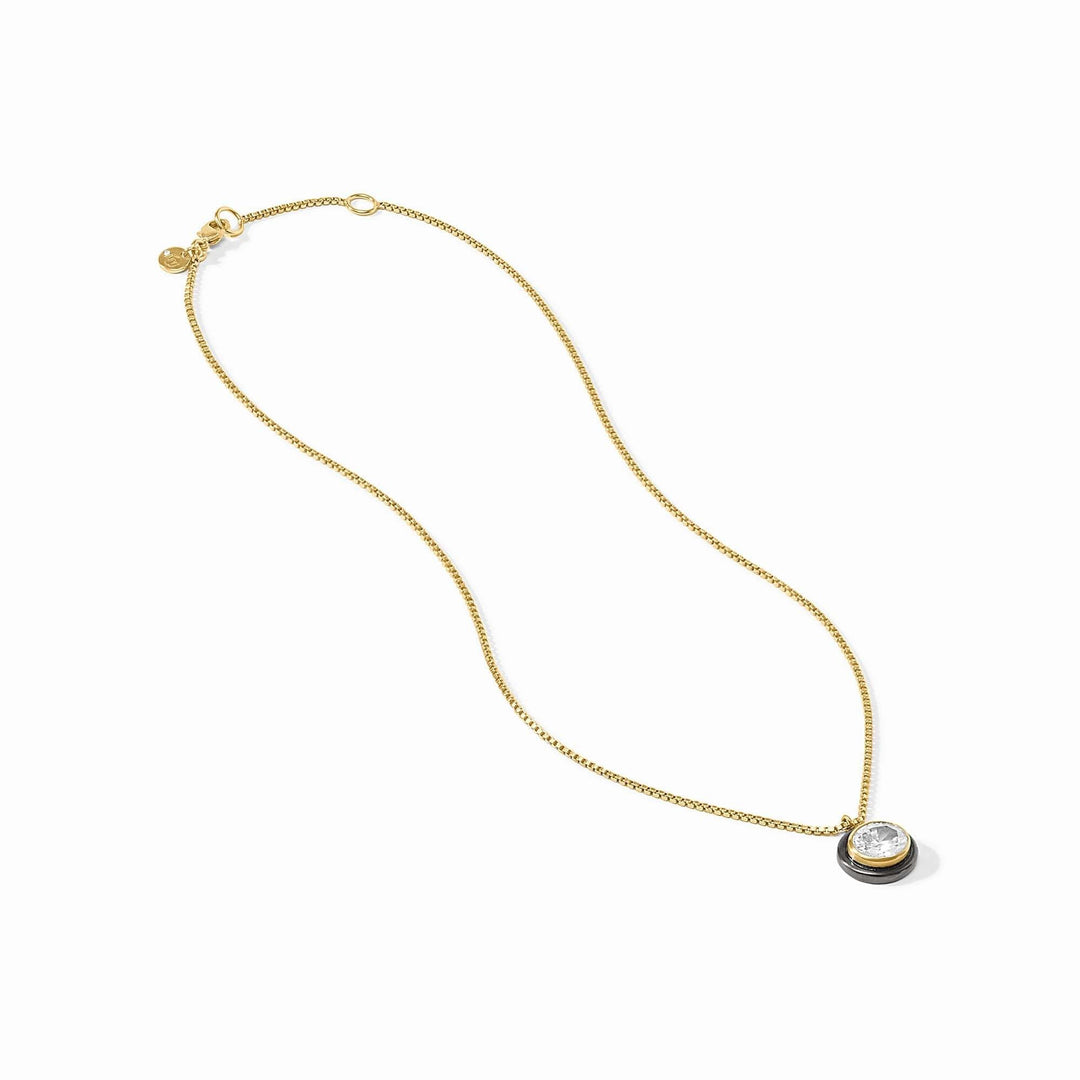 Delicate gold-plated necklace with a cubic zirconia pendant on an adjustable chain.