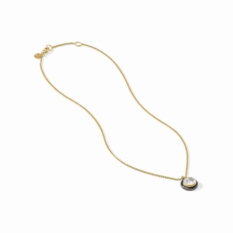 Delicate gold-plated necklace with a cubic zirconia pendant on an adjustable chain.
