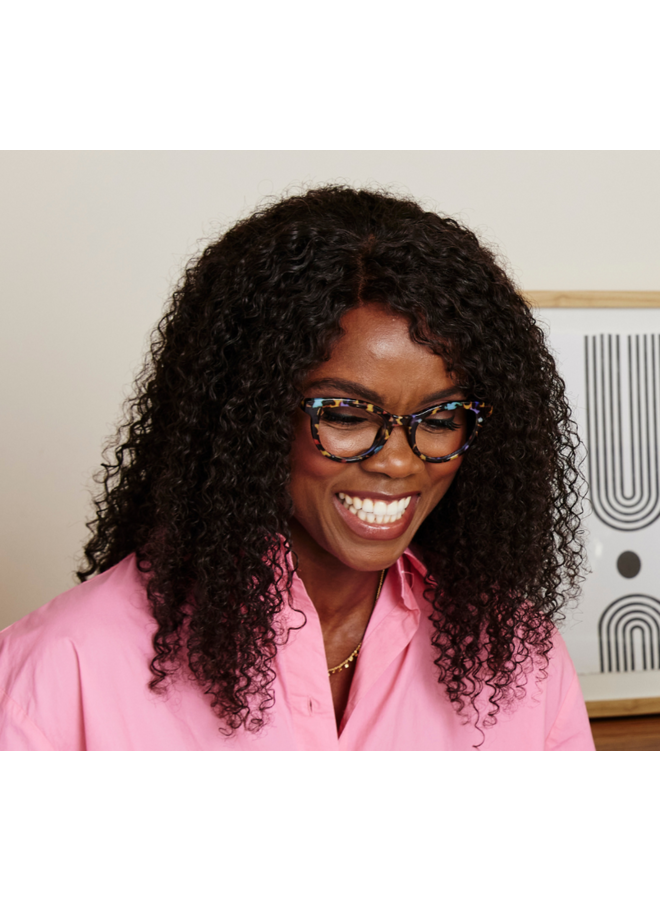 Tribeca eyeglasses with tortoise-shell frame featuring a patterned cat-eye silhouette and purple lens peepers.