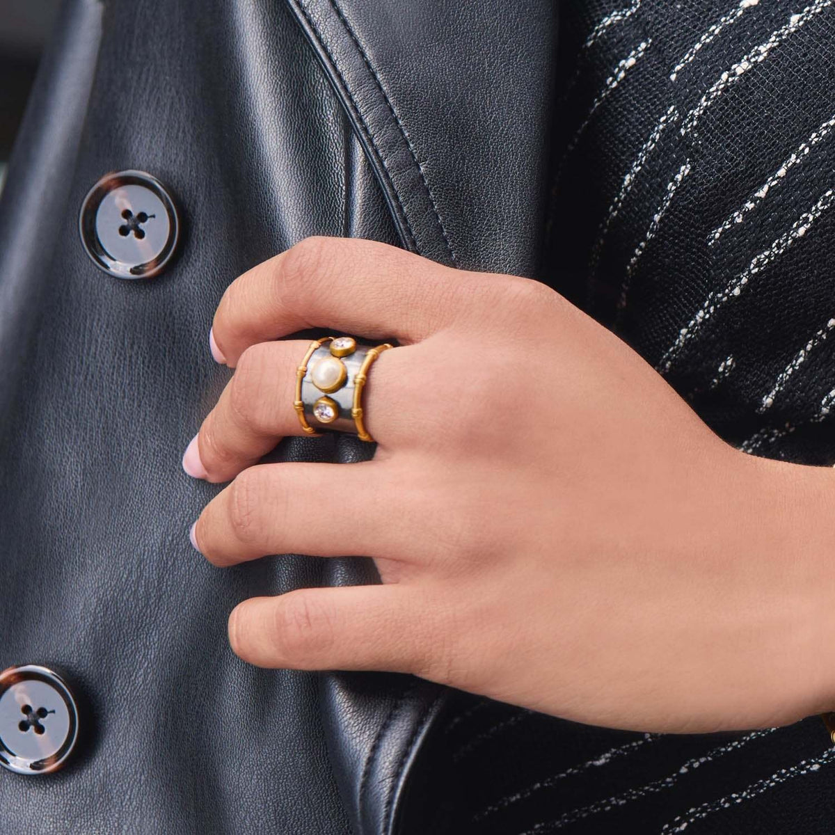 Adjustable Tribeca ring with shell pearl center stone in 24K gold plate.
