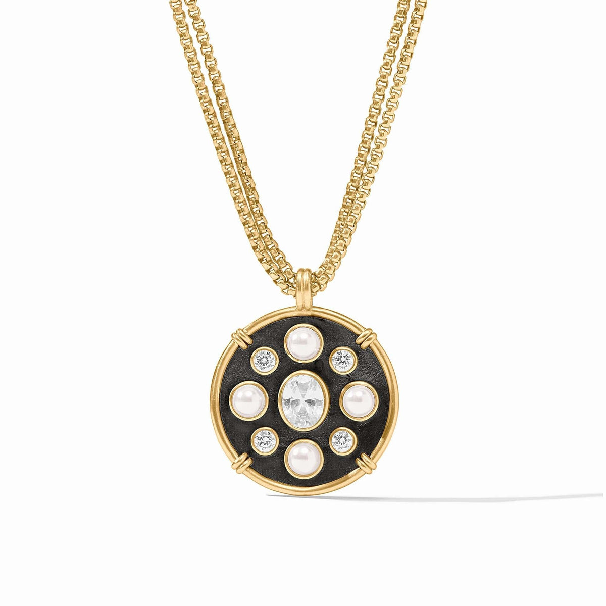 Adjustable Tribeca statement necklace with gold plate finish, shell pearl accents, and cubic zirconia pendant.