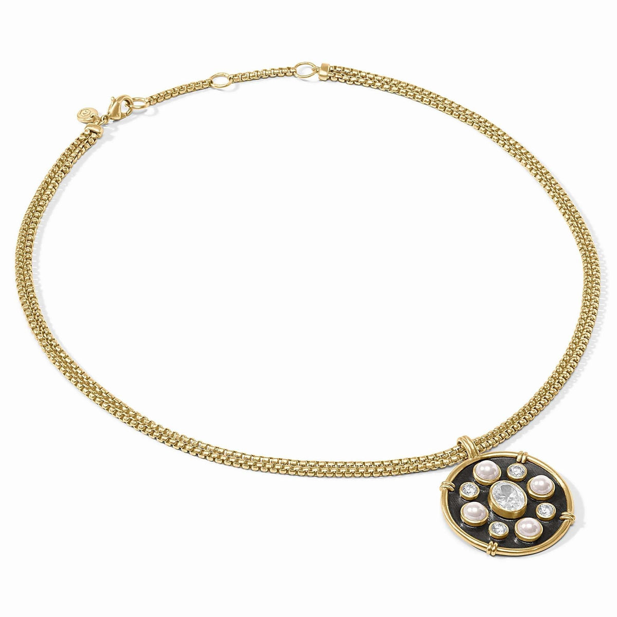 Adjustable Tribeca statement necklace with gold plating, shell pearl accents, and cubic zirconia stones.